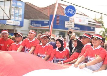 Semarak Kirab Merah Putih HUT Ke-80 RI, Mbak Wali Ajak Pemuda Perkuat Persatuan dan Nasionalisme
